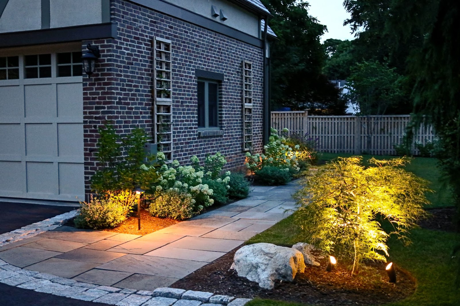 Path lighting is a feature of this landscape design