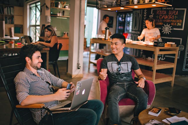 Two men  engaging in transparent communication, during their work or discussion.