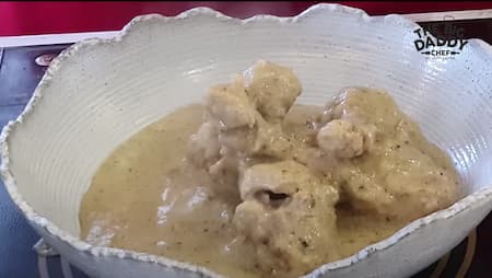 Chicken Kali Mirch garnished with fresh coriander, ready to be served hot.