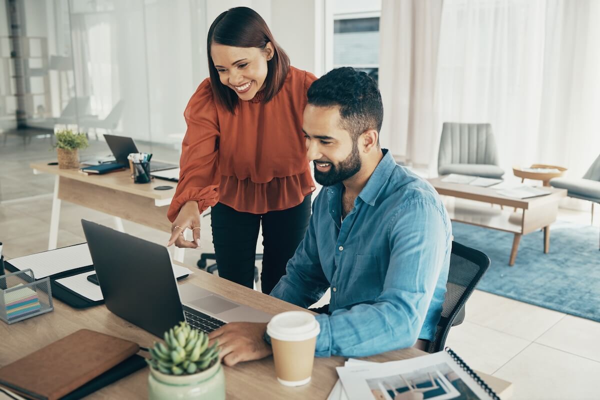 Mental health workforce shortage: employees using a laptop