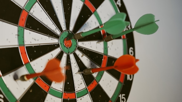 Red and green dart board 