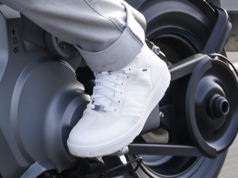 a biker wearing BMW Seoul GTX motorcycle boots