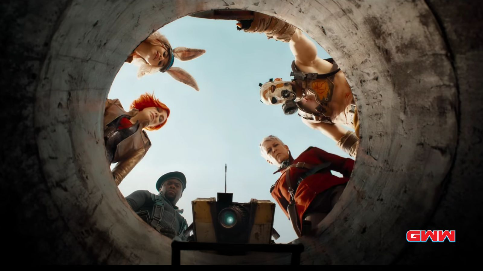 Main casts of Borderlands movie looking down a hole