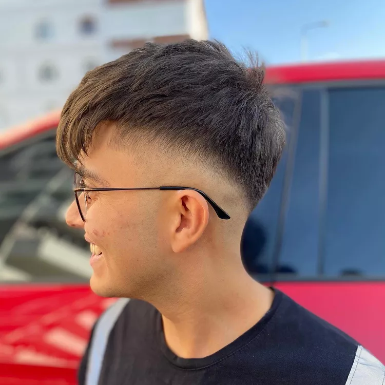 Picture of a man wearing the  Crop With Long Fringe and Natural Texture