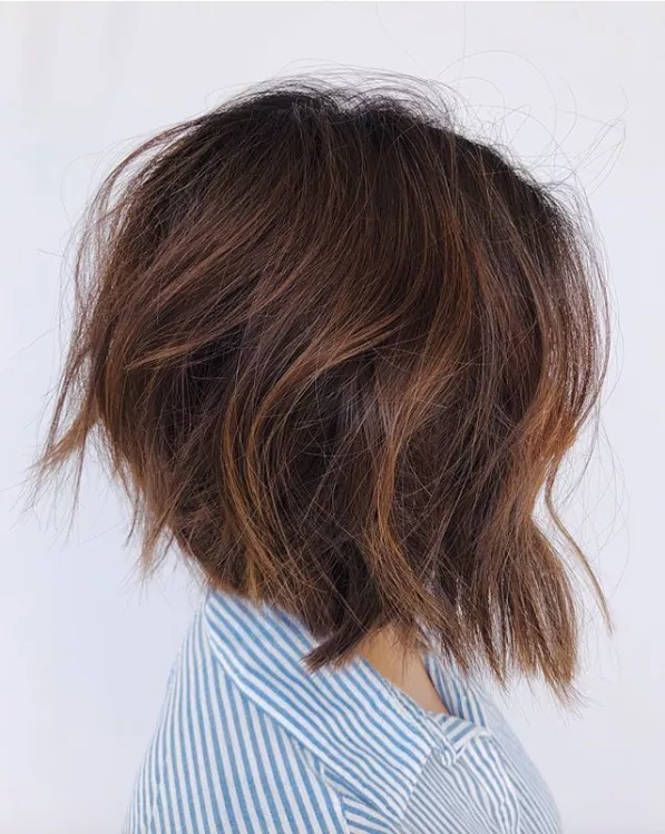 Back view of a lady wearing the long bob haircut