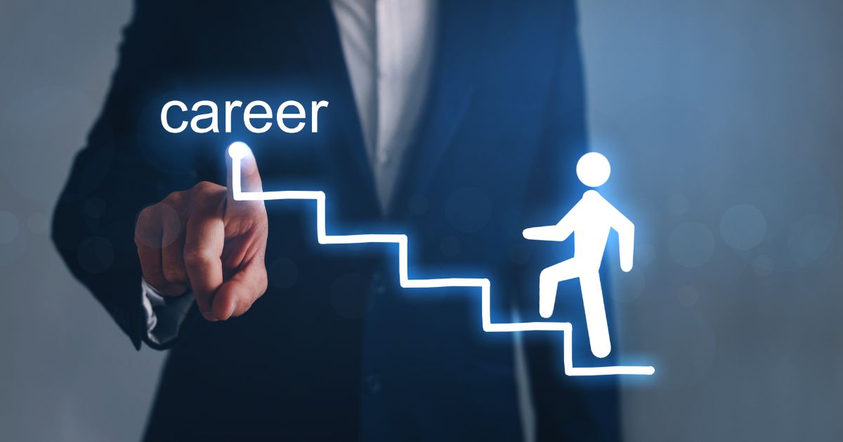 main pointing at a neon stairs with a man walking upwards to depict career development