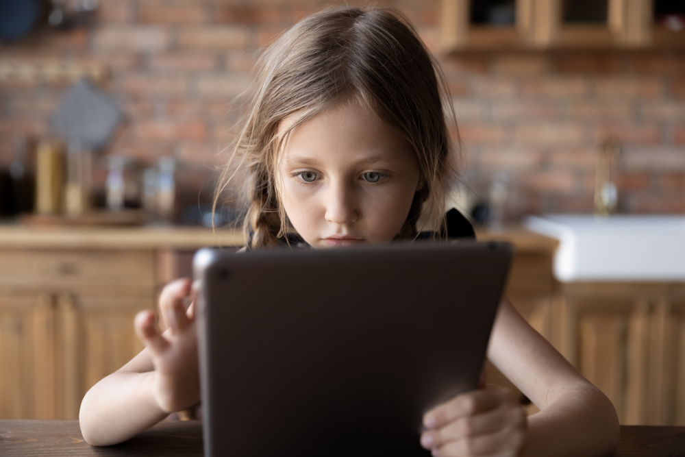 Young girl on her tablet
