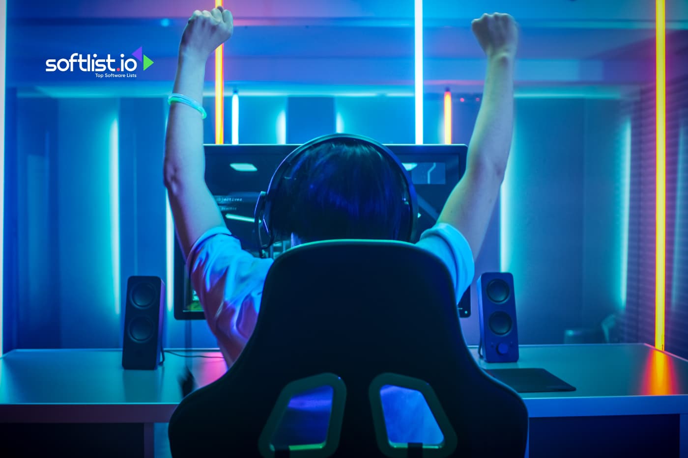 an online gamer raising his two hands