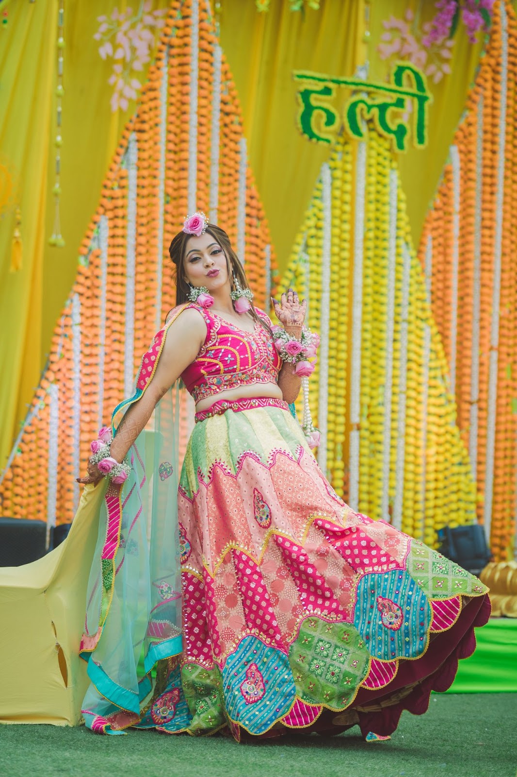  the bride during the haldi ceremony, showcasing her playful and beautiful moment. Captured during a wedding shoot in Indore by Harsh Studio Photography in 2024. Harsh Studio Photography is celebrated for their expert services in capturing joyful and memorable wedding moments, ensuring each image reflects the beauty and emotion of the occasion.