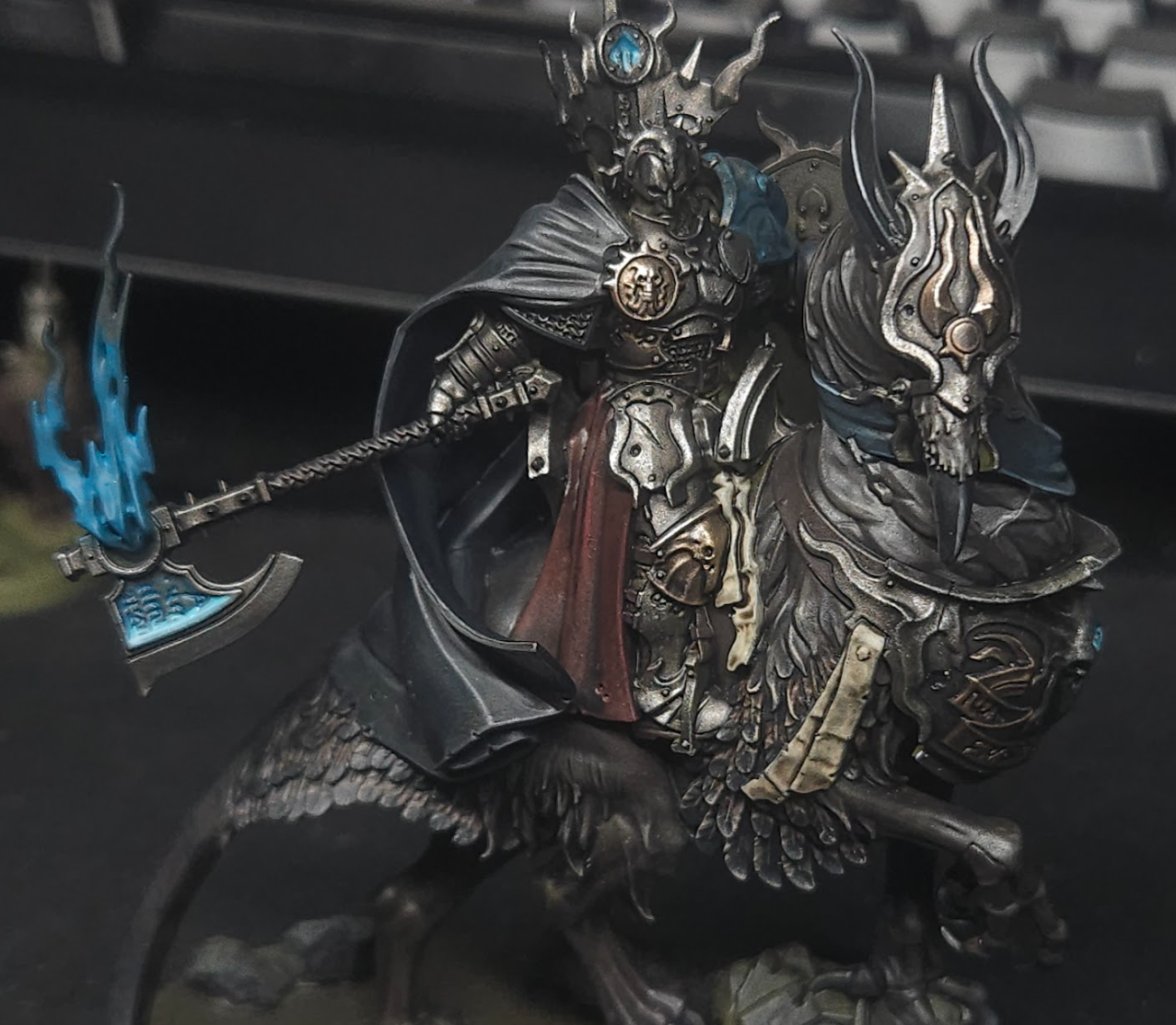 A statue of a person on a horse  Description automatically generated