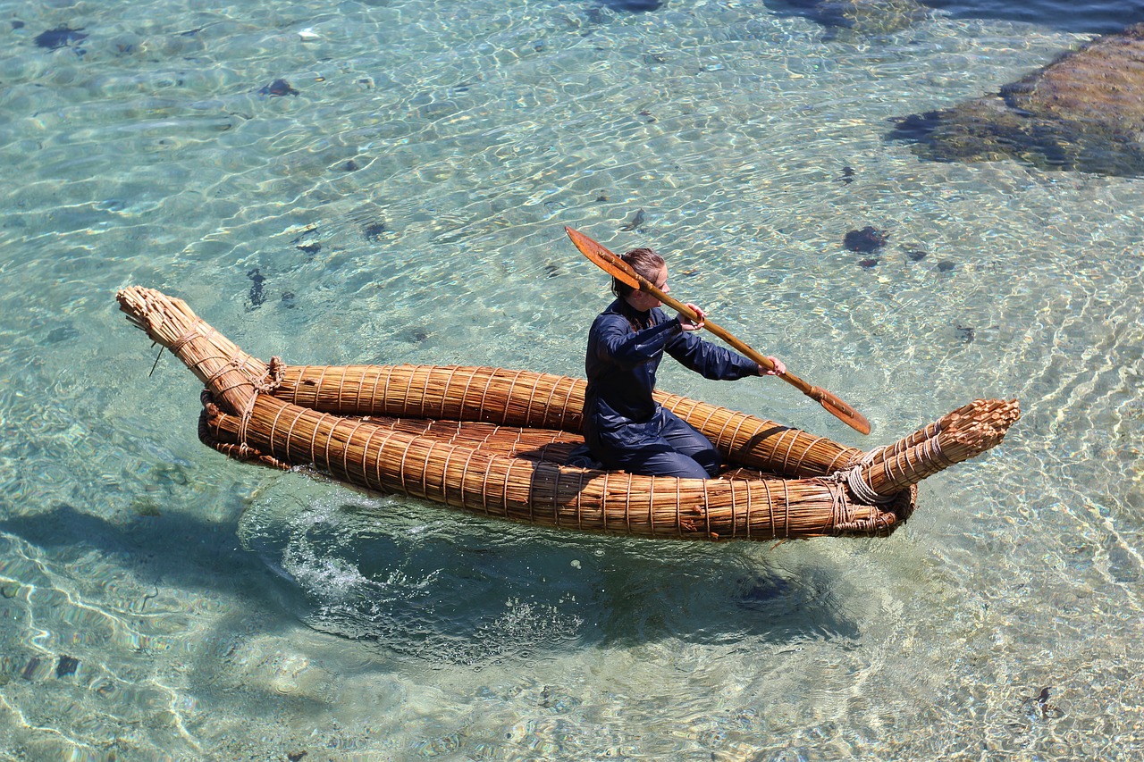 A woman kayaking on the US Beach