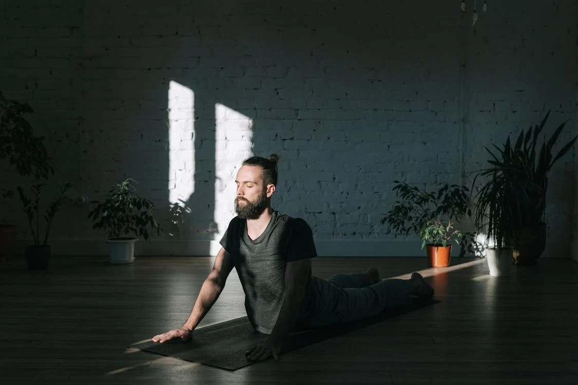 man doing yoga