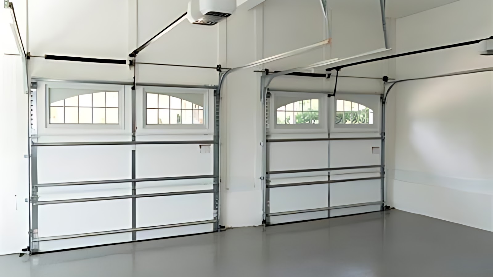 Two single garage doors with reinforcement struts