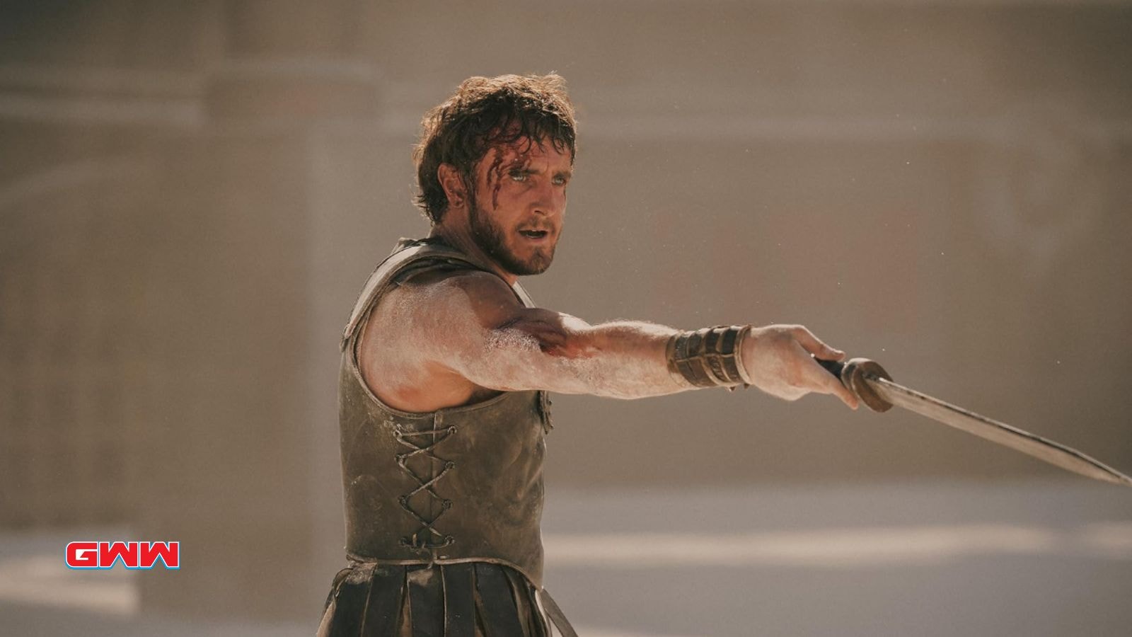 Paul Mescal as Lucius, pointing a sword in Gladiator 2 