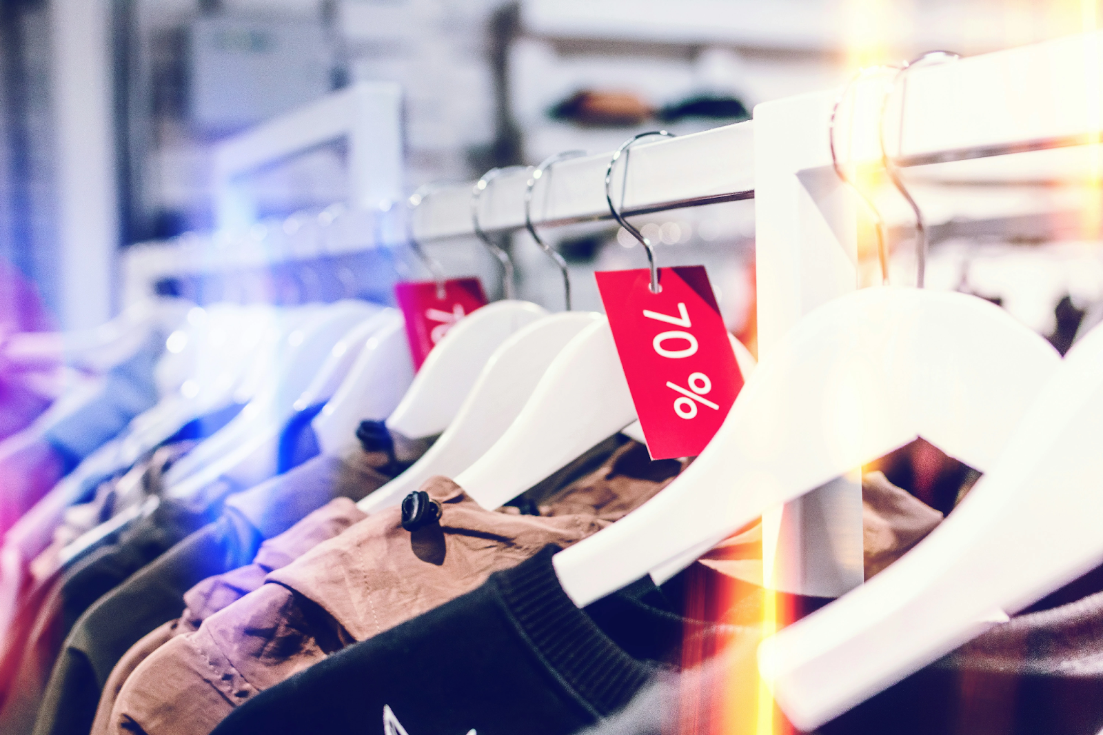 A rack of clothing items with a red tag.