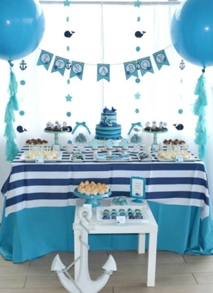 blue and white food table with white anchor