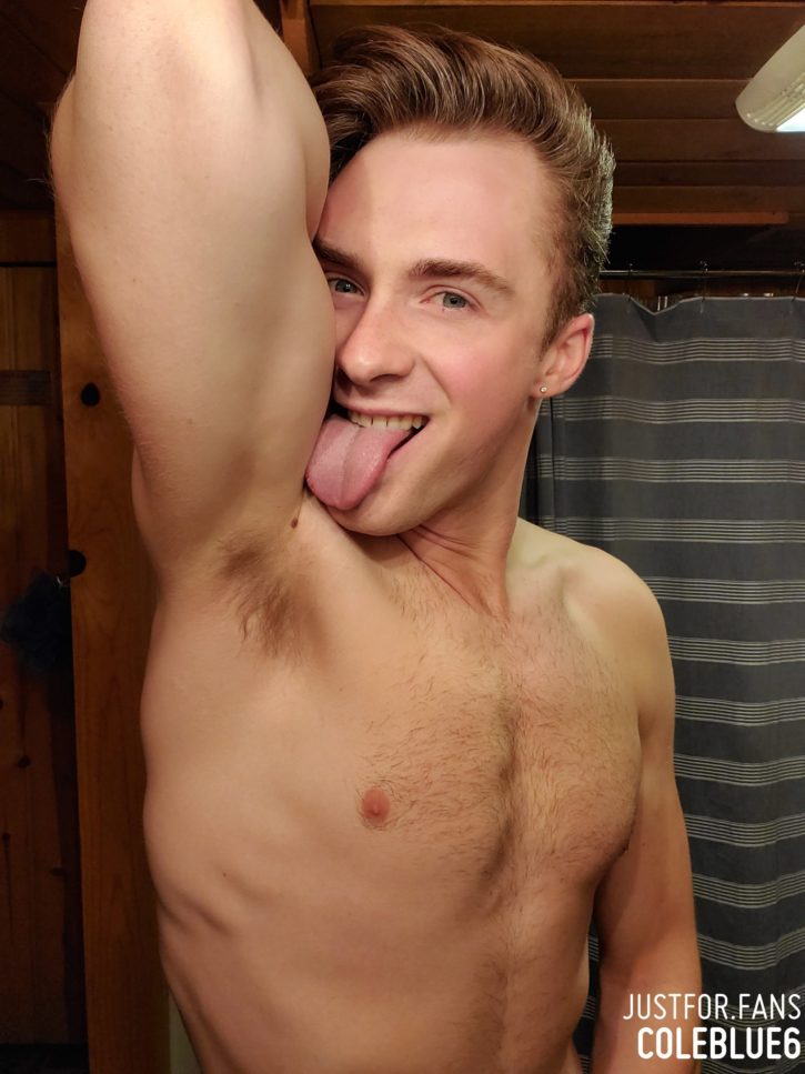 Cole Blue licking his pitts showing off his hairy muscle chest and smiling for the camera