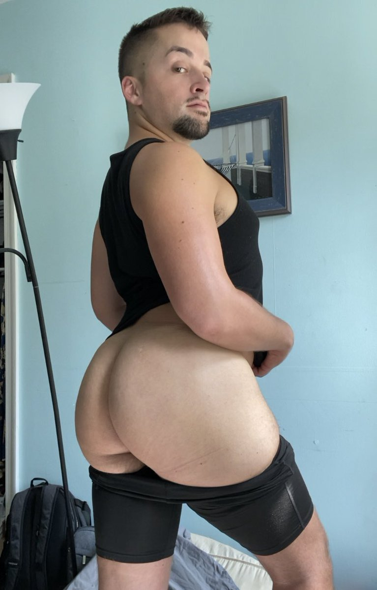 The Satyr Boy wearing a black tank top and his black shorts pulled down to reveal his fat gay bubble butt