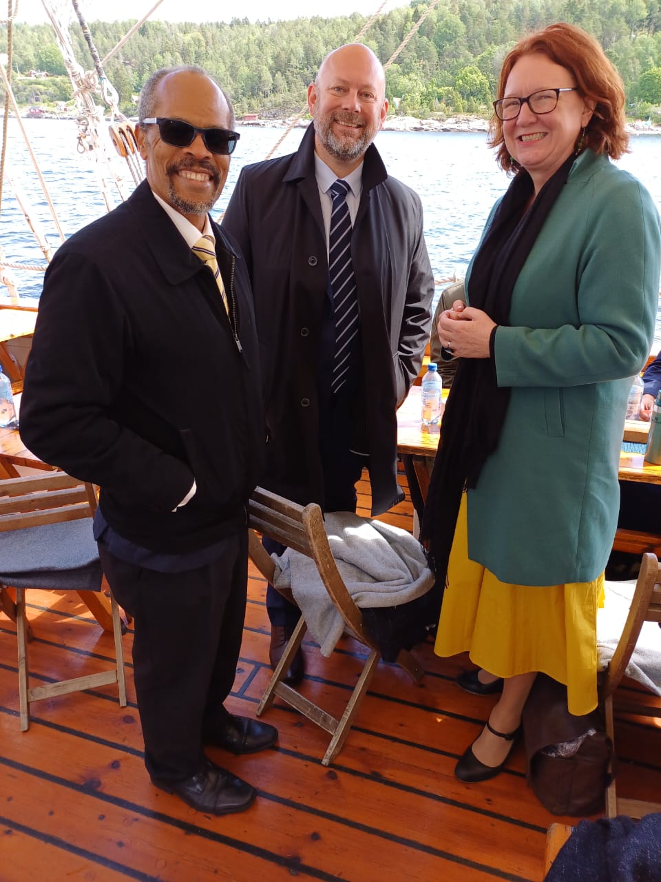 CRFM Executive Director speaking with Marianne Sivertsen Næss, Norwegian Minister of Fisheries and Ocean Policy and Gunnar Stølsvik, Specialist Director at the Blue Justice Secretariat