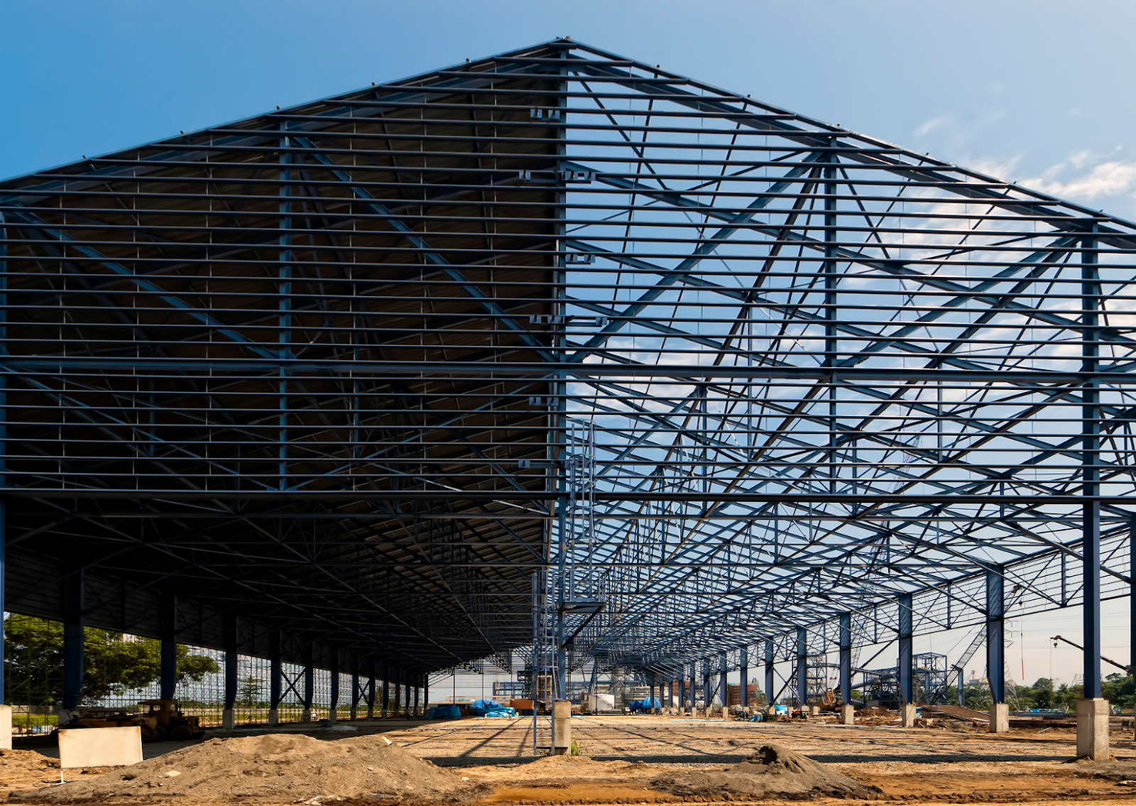 Discover the costs, benefits, and frequently asked questions about pre-engineered steel warehouses. Learn from Reich Construction LLC's expertise on how to efficiently plan and execute your warehouse project with confidence.