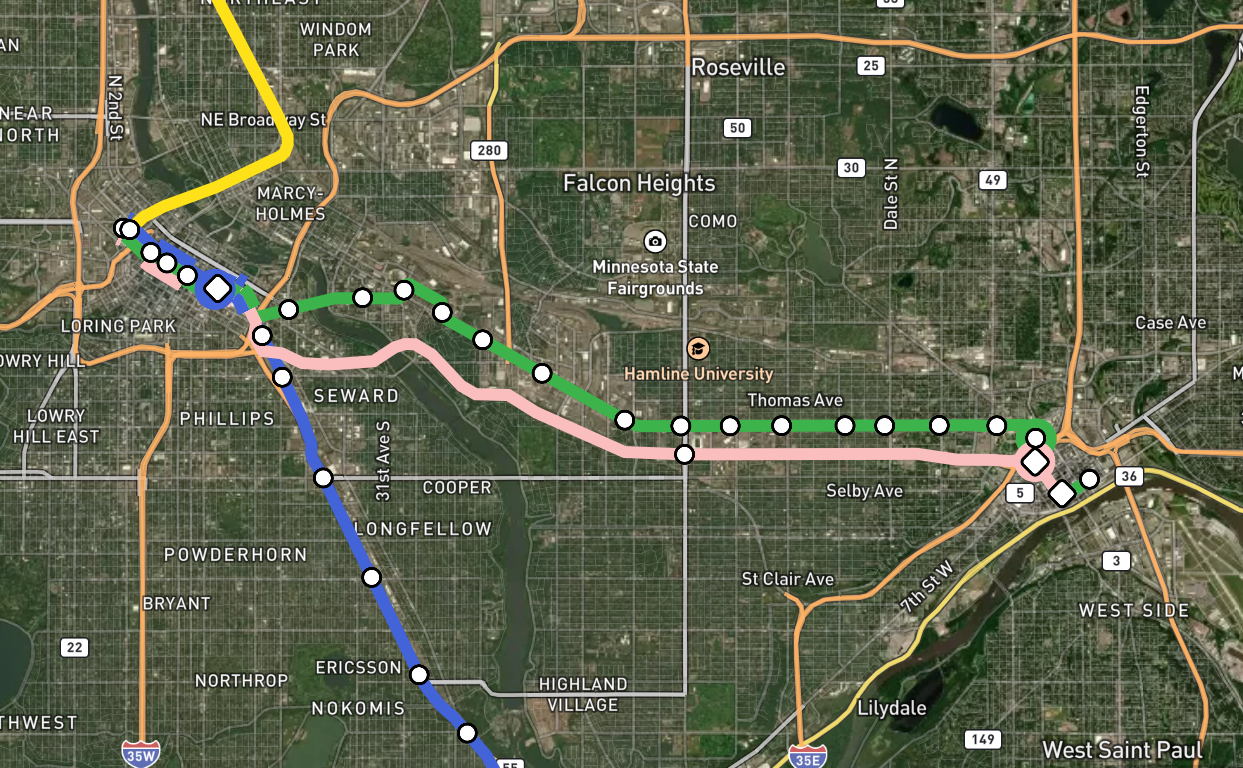 Map of proposed I-94 light rail alignment (the Pink Line), which runs in the interstate corridor and along existing rail in both Downtowns, with a stop in Midway on Snelling.