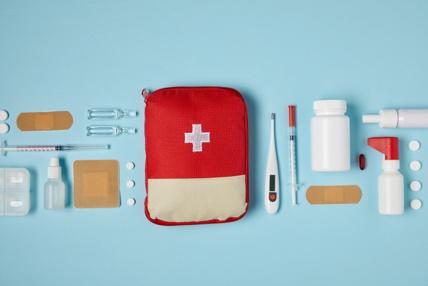 Red and white first aid kit