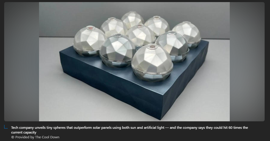 A group of round silver spheres on a blue box

Description automatically generated