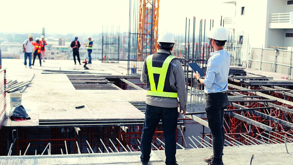 Civil engineers working on site