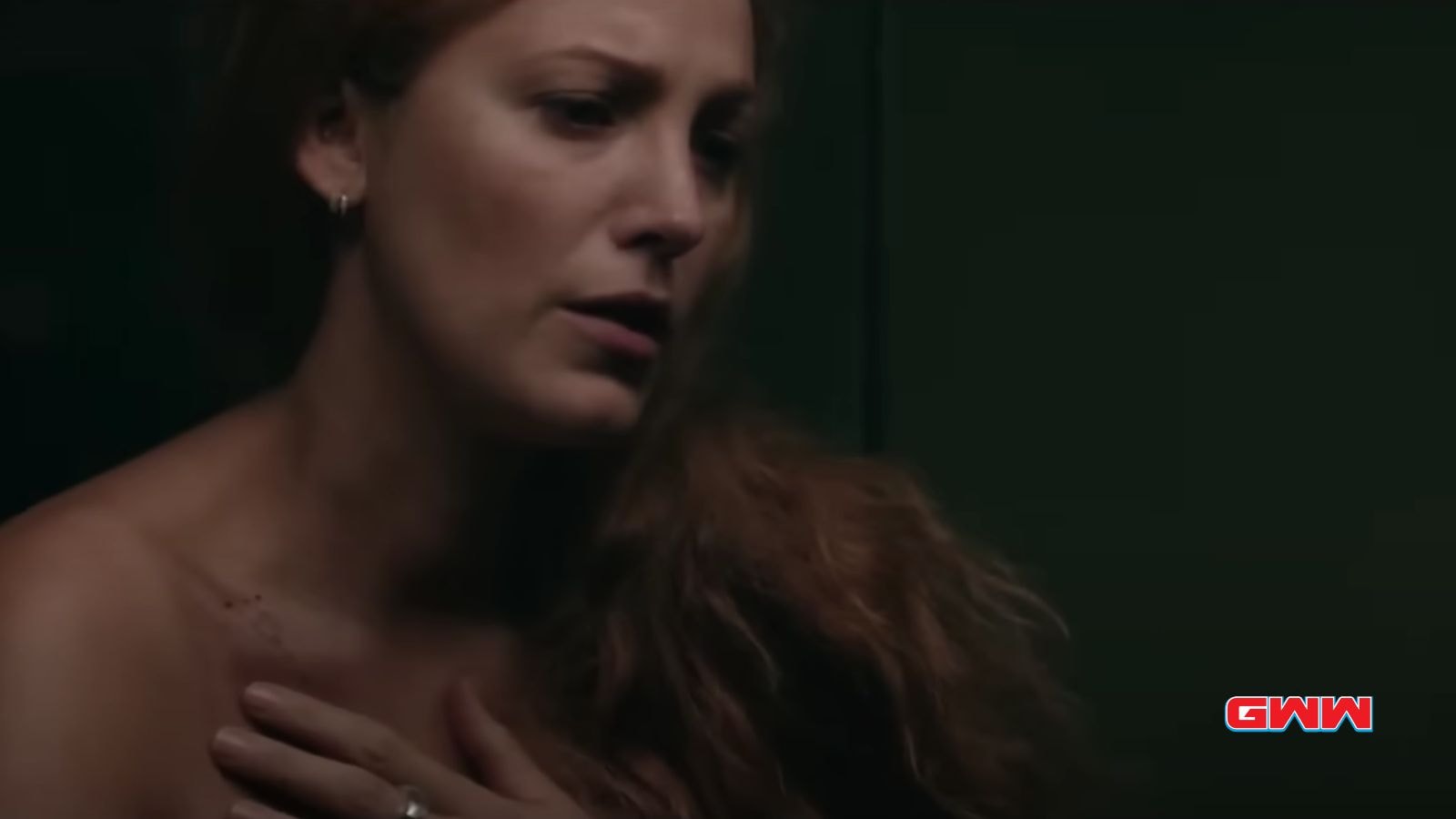 Lily touching a wound on her shoulder, Blake Lively It Ends With Us