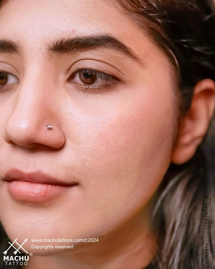 Types of nose piercing: Picture of a lady  wearing the Nostril Piercing 