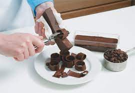 Cutting the Chocoate Bar for Cake