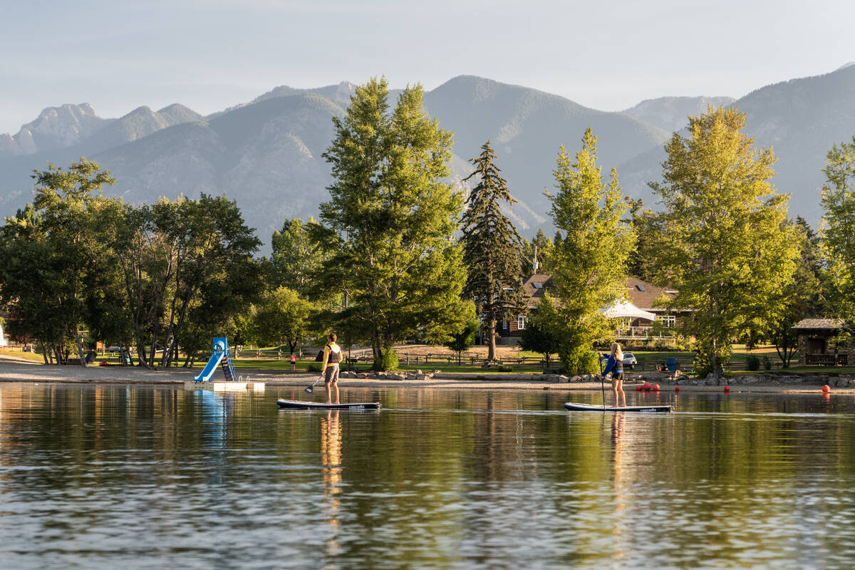 Paddle boarders on Windermere Lake