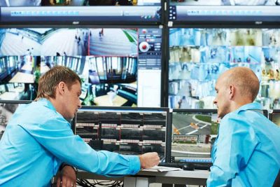 security workers monitoring a retail store's cctv system remotely