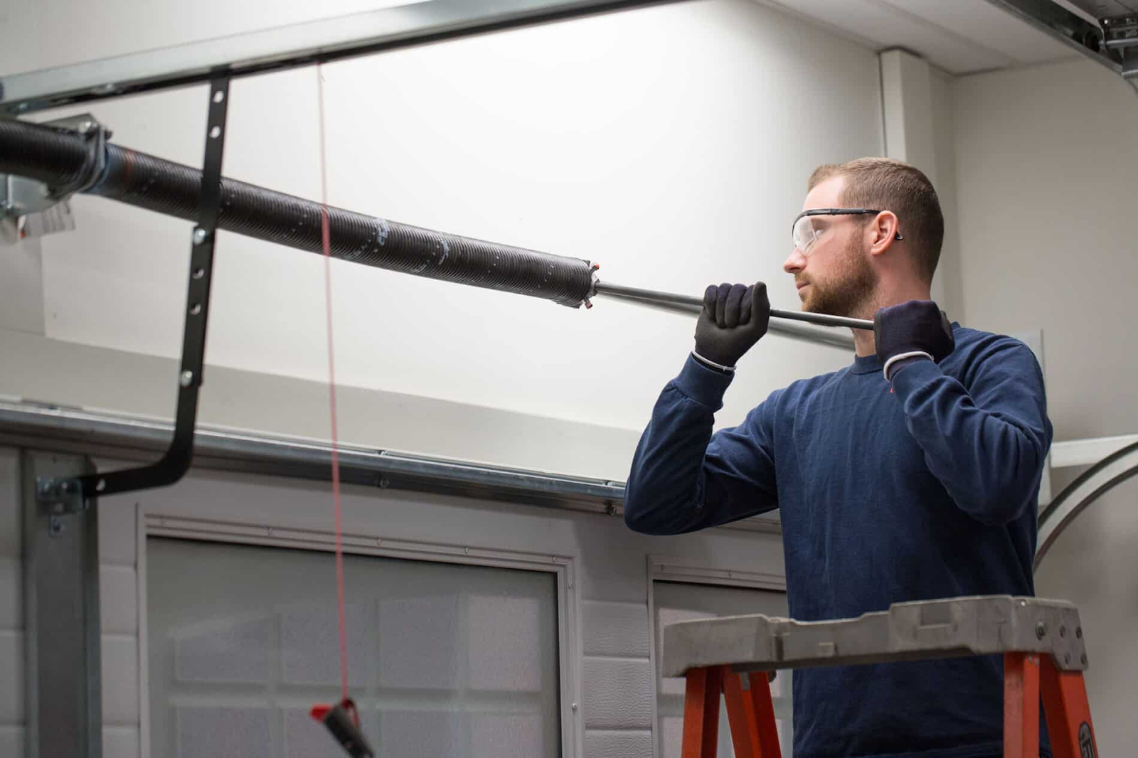 how to open a garage door with broken spring