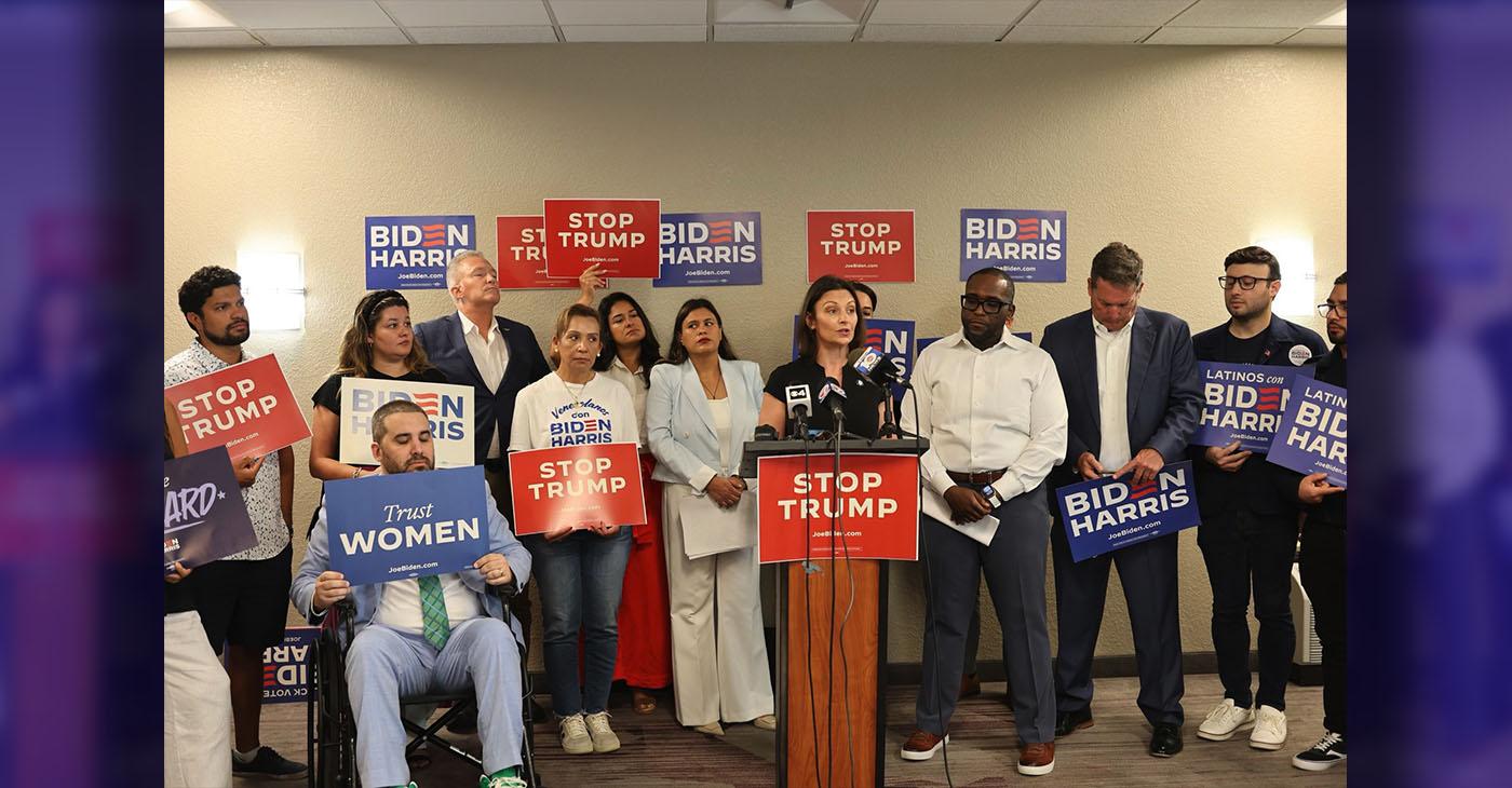 State Senator Shevrin Jones and Florida Democratic Party Chair Nikki Fried speaking at a press conference in Miami Florida