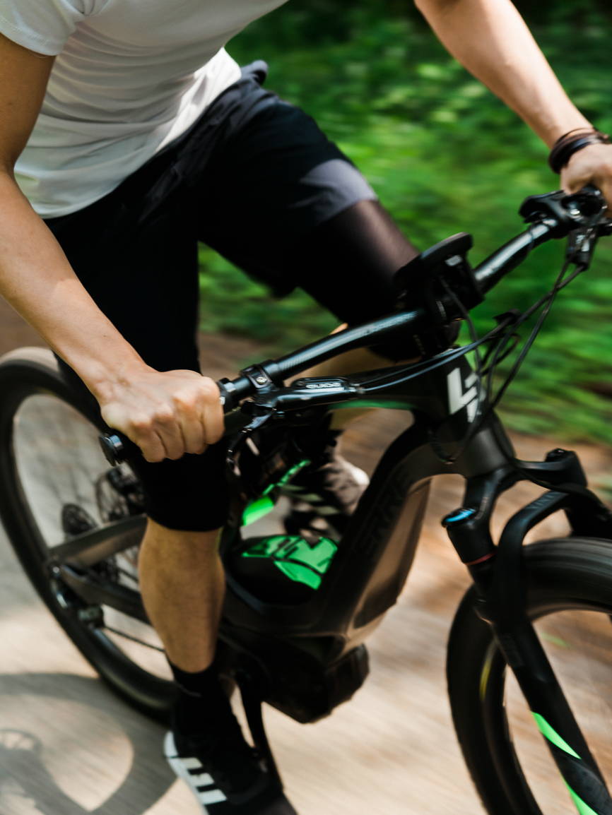 Very fast cyclist on his used speed bike .