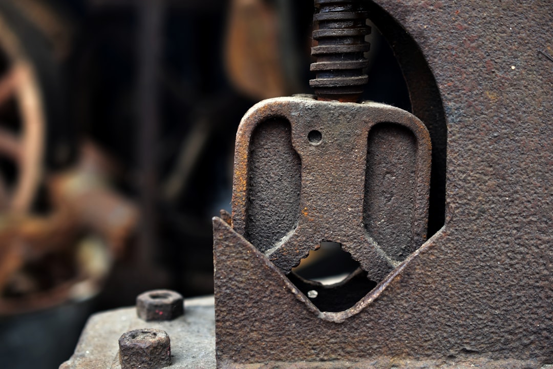 a close up of a metal object with a hole in it