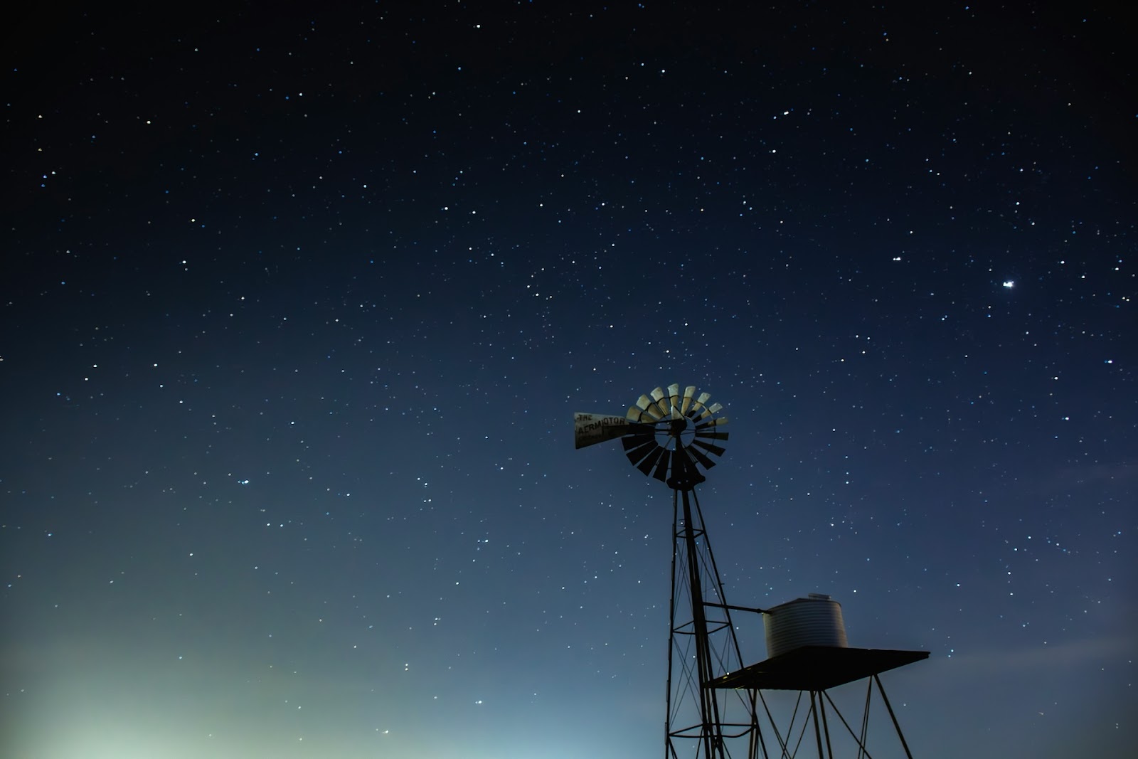 Windmill with starry backdrop