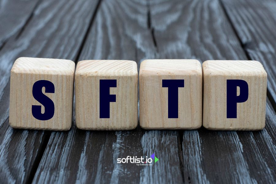 Wooden blocks spelling SFTP on a wooden surface.