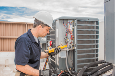 top ways to weatherproof your michigan home technician maintaining hvac system custom built okemos