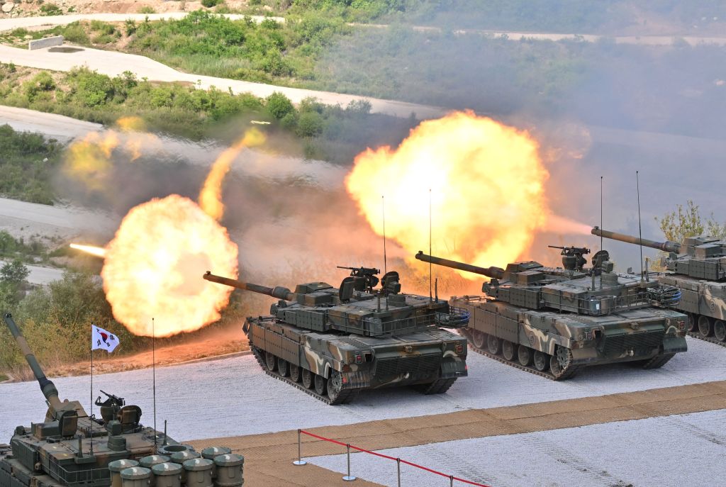 South Korea's K-2 tanks fire during a South Korea-US joint military drill at Seungjin Fire Training Field in Pocheon on June 15, 2023. (Photo by JUNG YEON-JE / POOL / AFP) (Photo by JUNG YEON-JE/POOL/AFP via Getty Images)