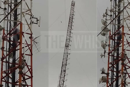 JUST IN: Man Climbs TV Mast In Abuja, Threatens Suicide Over Economic Hardship