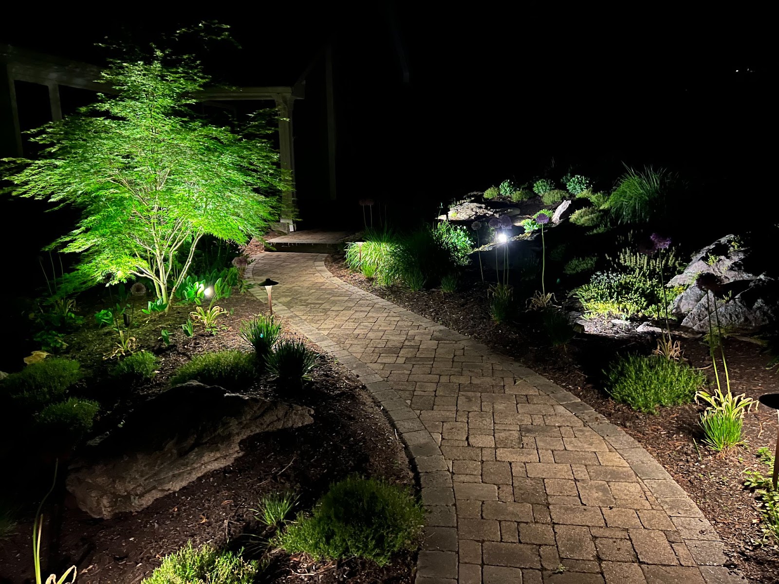 a well-path created by an outdoor lighting designer