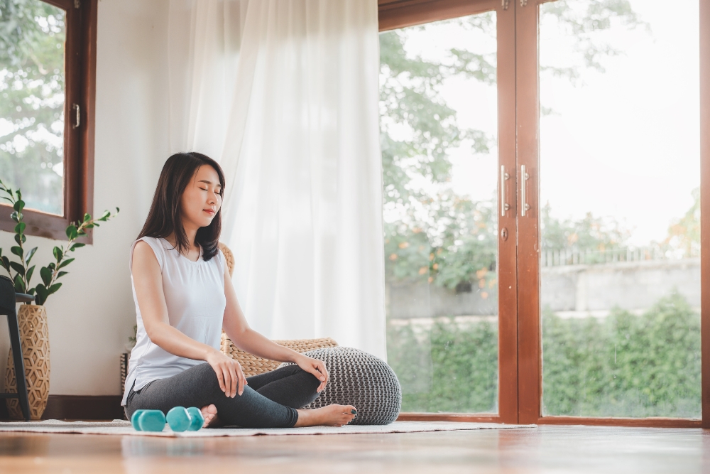 Young women doing Zen Meditation in the morning. 