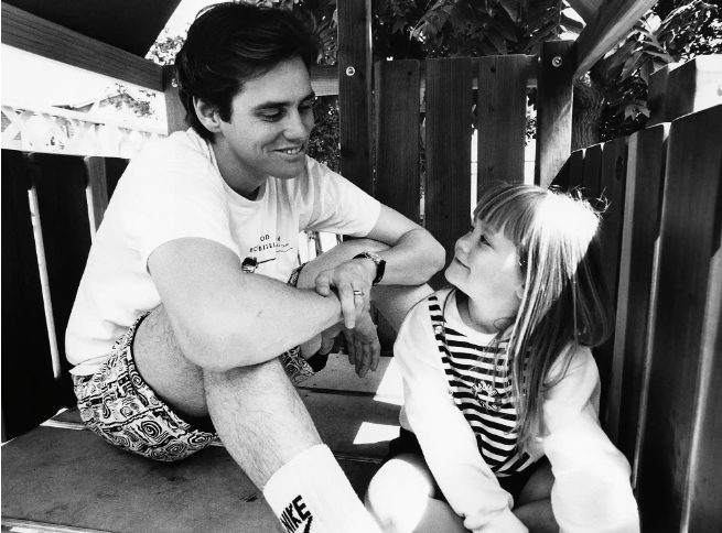 a younger Jane Erin Carrey with her father