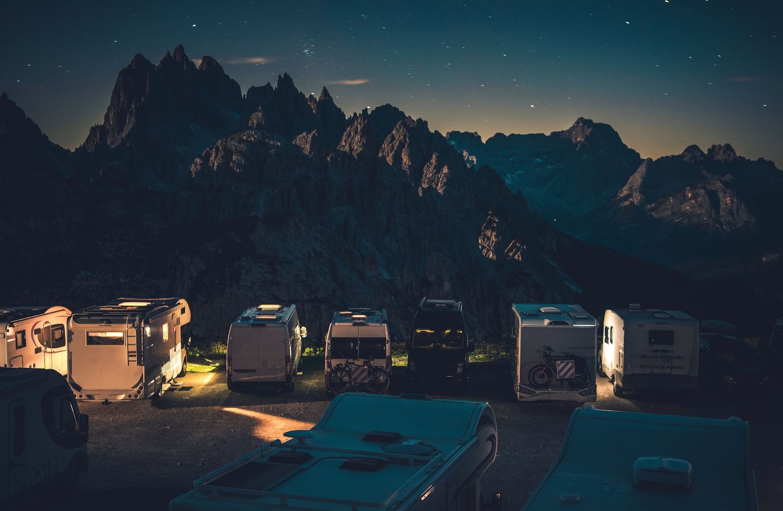 Campers night camping by the mountains