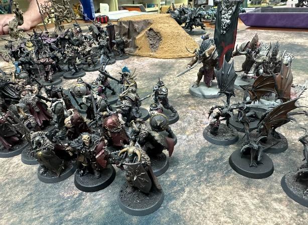 A group of figurines on a table Description automatically generated