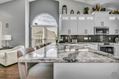 essential considerations for choosing kitchen countertops quartz island with white cabinets custom built michigan