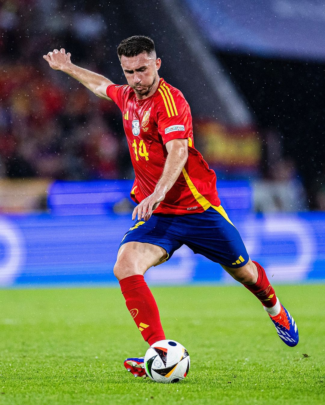 Photo by Aymeric Laporte 2️⃣7️⃣ on June 30, 2024. May be an image of 1 person, playing football, playing soccer, cleats, ball, stadium and text.