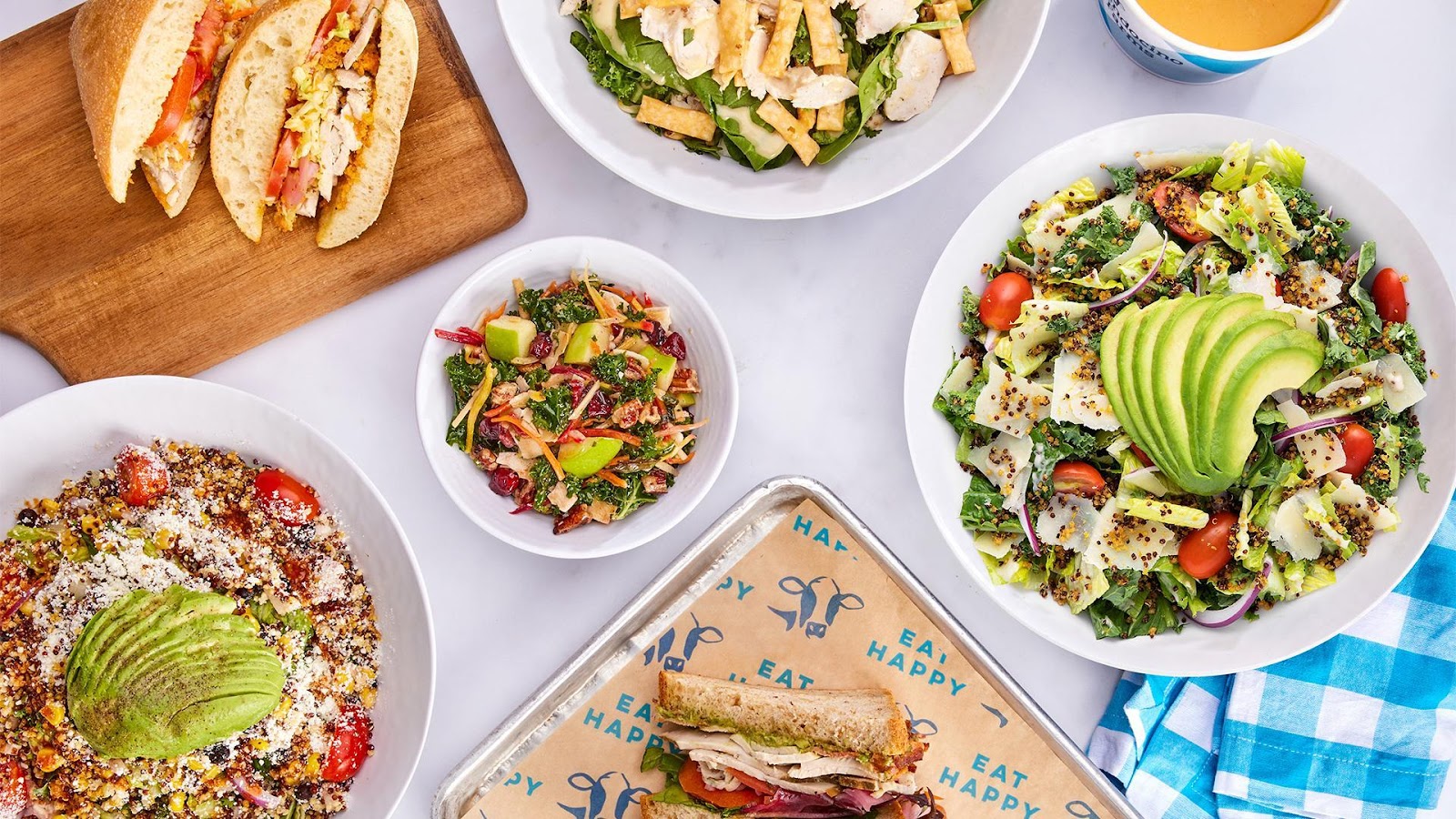 Top down view of fresh meals, salads, sandwiches at Mendocino Farms